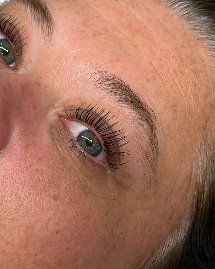 Lash lift result, close up of lifted, curled lashes and a brushed-up brow